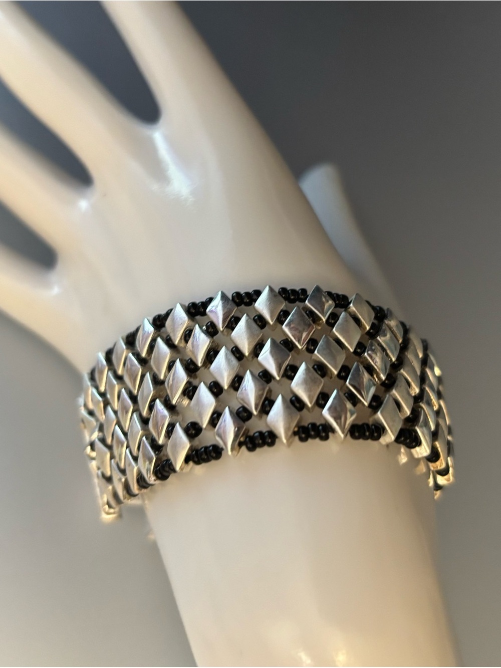 Napier signed Bracelet with Black Bead Inlay